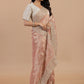 “Blush Gold Pure Tissue Saree with Intricate Hand Cording Work”